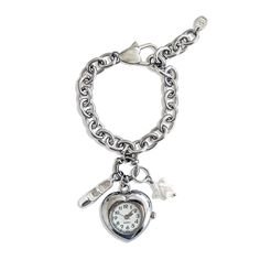 Bracelet featuring a freshwater pearl star, heart watch, and mary jane charms Battery powered (a battery is already included) *To activate watch battery, remove the white plastic on the knob and push knob inwards MATERIALS Chain material: Stainless steelCharm material: Freshwater pearl, silver plated over brass MEASUREMENTS Chain length: Adjustable from 5-7 inchesCharm measurements: Watch measures 25 x 25 mm Hard Jewelry Brand, Gemini Jewels, Dope Jewelry Accessories, Watch Pendant, Heart Watch, Always Late, Charms For Bracelets, Latest Watches, Watch Battery