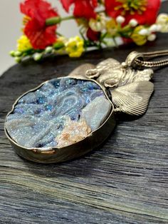 "Artisan Rainbow Druzy pendant comes with 20\" silver chain Hand-made Sterling Silver 925. Stones used: Rainbow Druzy, Pink Tourmaline. Height -2 1/2\" (including bail), Width - 1 3/4\" Height - 65mm (including bail), Width - 45mm Unique Handcrafted One-of a-kind Design Pendant Each Piece of Jewelry in my Collection is Absolutely One of a Kind! When you start wearing a piece of my jewelry you will fall in love with it more and more each day and feel that good Energy and Love that I pass into it Oval Pendant Jewelry With Large Stone For Gift, Handmade Pendant Necklace In White Gold, Gift Necklace With Large Round Stone, Handmade White Gold Pendant Necklaces, Sterling Silver Jewelry With Large Healing Pendant, Handmade Silver Necklace With Rectangular Pendant, Unique Silver Necklace With Rectangular Pendant, Artistic Oval Silver Necklace, Unique Silver Necklace With Polished Finish