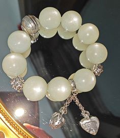 Material:moonstone beads size :Approx 19mm   quantity: one strand  6mm approx 29 pcs one strands 7mm approx25 pcs one strands 8mm approx 22 pcs one strands 9mm approx 21pcs one strands 10mm approx 19 pcs one strands 11mm approx 18pcs one strands 12mm approx 16 pcs one strands 13mm approx 16 pcs one strands 14mm approx 15 pcs one strands 15mm approx 14pcs one strands 16mm approx 14 pcs one strands 17mm approx 13pcs one strands 18mm approx 13pcs one strands 19mm approx 12pcs one strands 20mm appro Elegant Heart Beads Bracelet, Silver Crystal Bracelet With Heart Shaped Beads, Silver Crystal Bracelet With Heart And Round Beads, White Elegant Beaded Bracelets With Gemstone Beads, Elegant White Moonstone Beaded Bracelets, Elegant Crystal Bracelet With Gemstone Beads And Moonstone, Elegant Moonstone Crystal Bracelet With Gemstone Beads, Elegant White Stretch Bracelet With 8mm Beads, Elegant Moonstone Beaded Bracelets