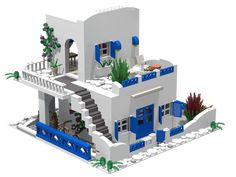 a lego model of a house with blue shutters