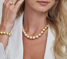 This exquisite Golden South Sea pearl necklace features 10-12mm, AAA quality pearls hand-picked for their radiant luster and overtones.  This necklace can be customized to your specifications, and comes packaged in a beautiful jewelry gift box with an official certificate of authenticity as well as a complementary pearl care kit.  This strand can also be purchased with an official appraisal by the GLA (Gemological Laboratory of America) detailing the specifics and retail value of the strand. A u Golden South Sea Pearl Necklace, Pearl Trend, South Sea Pearl Necklace, Southern Christmas, Single Pearl Necklace, Golden South Sea Pearls, Mother Of Pearl Jewelry, Pearl Jewelry Wedding, Buy Necklace