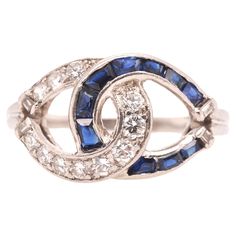 Year: 1950s Item Details: Ring Size: 7.25 Metal Type: Platinum [Hallmarked, and Tested] Weight: 6.1 grams Diamond Details: .30ct total weight, natural diamonds, E-F Color, VS Clarity, Transitional Round Cut & Straight Baguette Cut Sapphire Details: Natural, Blue, Baguette Cut, .40ct total weight. Band Width: 1.6 mm Condition: Excellent Sapphire Cocktail Ring, Vintage Sapphire, Fun Jewelry, Baguette Cut, Sapphire Diamond, Jewelry Rings Engagement, Cocktail Ring, Cocktail Rings, Anniversary Rings