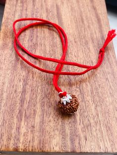 Welcome, Namaste  100% Genuine & Premium Collector Quality Rudraksha 100% Original & Authentic Mahadeva Shiva 8 Mukhi (Ashtamukhi in Sanskrit) Rudraksha Necklace The necklace has - 8 mukhi - Origin - Indonesia Eight Mukhi Rudraksha Represents Lord Ganesha- remover of obstacles and for new beginnings.  Ruling planet - Ketu  Mantra - Om Hum Namah All our Spiritual Products Are Spiritually activated With Mantras & Puja's also known as Abhisheka by our Panditji Priest without any extra charges. Traditional 108 Beads Jewelry Gift, Adjustable Amulet Mala For Rituals, Spiritual Round Pendant Necklace For Diwali, Adjustable Silver Mala For Meditation, Spiritual Jewelry With 108 Beads For Yoga, Spiritual 108 Beaded Jewelry For Yoga, Round Beads Jewelry For Meditation And Festivals, Spiritual Pendant Jewelry For Puja, Silver Adjustable Spiritual Mala