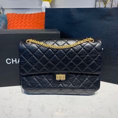 Description Chanel 2.55 Handbag Gold toned hardware Black For Women, Women’s Bags, Shoulder And Crossbody 11in/28cm A37586 Y04634 C3906 Measurements: 28 x 8.5 x 17 cm / 11 x 3.3 x 6.7 inches (Length x Width x Height) BlackGold-toned hardwareAdjustable chain shoulder strapBeautifully structured flap-over design Includes box, dust bag.This product is of the premium quality. Louis Vuitton Shirt, Chanel Shirt, Gucci Gg Marmont, Gold Handbags, Chanel 2, Luxury Products, Loafer Mules, Belt Accessories, Chanel Handbags