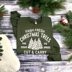 Gildan Unisex Heavy Blend Crew Neck Sweatshirt (Forest) Farm Fresh Christmas Trees Cut and Carry Sweatshirt Materials: 50% Cotton 50% Polyester  Wash inside out on delicate, Tumble Dry Low Farm Fresh Christmas Trees, Womens Christmas Shirts, Fresh Christmas Trees, Christmas Tree Shirt, Winter Shirts, Tree Shirt, Holiday Sweatshirt, Christmas Tree Farm, Winter Sweatshirt