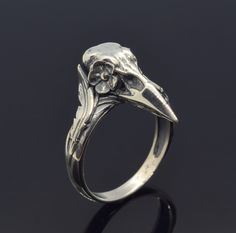 Oxidized Silver Raven Norse Ring, Crow Bird Skull Ring, Crow Ring. ArmenianJewelryHouse personnel do everything to complete the customer's safety and experience.  Item Details  - Material: 925 Sterling Silver - Weight ~ 7.00 Grams(Depending on size) - Gender: Male / Female - Finish: Oxidized Silver / Polished Silver - The product is handmade and its weight may vary up to 1.00 grams. - We recommend using the main photo version of the item(If there are any other options). ✔ Shipped in 5-7 Business Bird Skull Ring, Unique Skull Rings For Gifts, Unique Skull Shaped Anniversary Rings, Gift Skull-shaped Hallmarked Rings, White Gold Skull Ring As A Gift, White Gold Skull Rings For Gifts, White Gold Skull Rings As Gift, White Gold Skull Ring For Gift, Nickel-free Skull Rings For Gift