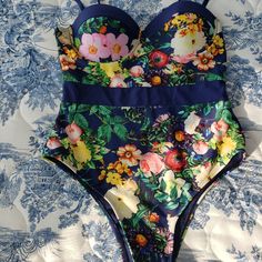 Fashion Nova Floral One Piece Push Up Swimsuit Size S. Push Up Cups. Contrast Waistband. New Without Tags. Never Worn. Comes From Clean Pet And Smoke Free Home. Blue Fitted Swimwear For Summer Parties, Beachwear Party Bodysuit With Floral Print, Fitted Blue Swimwear For Summer Parties, Party Beachwear Bodysuit With Floral Print, Blue Stretch Bodysuit With Floral Print, Blue Floral Print Stretch Bodysuit, Party Bodysuit With Floral Print, Blue Lined Swimwear For Party, Blue Floral Print Bodysuit For Summer