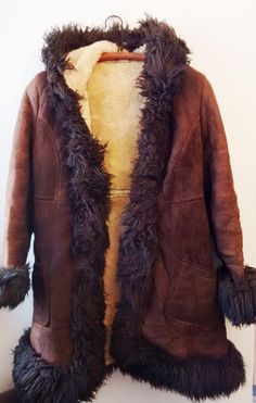 Vintage sheep fur genuine Leather coatFur lining is soft and nice Very beautiful and warm.100% sheep  fur,  LeatherBest Fit size  S MeasurementsShoulder width 41 cm / 16.14   inch Armpit to armpit  51  cm / 20.07  inch Length 85  cm /   33.46  inch   Good  vintage condition.  There are some stains aged.>>> FREE Shipping all  world wide.feel free to contact us if you have any questions.Really like vintage? We too! Get to know us here ▻▻▻https://www.etsy.com/uk/shop/DorisVintage/about?ref Shearling Long Fur Coat For Cold Weather, Long Shearling Fur Coat For Cold Weather, Shearling Long Coat For Cold Weather, Winter Sheepskin Fur Coat With Faux Fur Lining, Sheepskin Long Fur Coat For Cold Weather, Sheepskin Long Coat For Cold Weather, Hooded Brown Sheepskin Fur Coat, Long Mink Sheepskin Fur Coat, Mink Colored Long Sheepskin Fur Coat