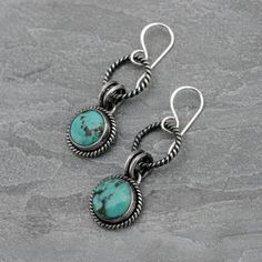 "One of a kind Turquoise Earrings.   Unique, one of a kind turquoise cabochons set in solid sterling silver.   Sterling silver French ear wires. Total length from the top of the ear wire to the bottom of the earring is 1 3/4 inches. Turquoise cabochons are  1/2\" across. One of a kind, ready to ship. You may also like: https://www.etsy.com/shop/KiraFerrer For more turquoise: https://www.etsy.com/shop/KiraFerrer?ref=hdr_shop_menu&search_query=turquoise" Bohemian Oval Cabochon Earrings, Sterling Silver Turquoise Cabochon Earrings, Oxidized Turquoise Oval Jewelry, Turquoise Cabochon Drop Earrings, Southwestern Style Jewelry With Oxidized Finish, Southwestern Style Oxidized Round Jewelry, Turquoise Cabochon Dangle Jewelry, Turquoise Cabochon Bohemian Jewelry, Southwestern Turquoise Jewelry With Ear Wire