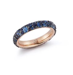 an 18k rose gold ring set with blue sapphires and black diamonds, by van cleef