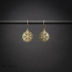 "Gold Lace Flower Shape Dangle Earrings, a symbol of refined femininity and intricate craftsmanship. These earrings boast a captivating design inspired by delicate lace and fashioned into a beautiful flower shape. The intricate lace-like detailing adds a vintage charm, making them an ideal accessory for both casual and formal occasions.  ★Comes in our signature gift box, ready for gift giving.  ★ Available in Gold [ gold-filled ear wires & gold plated brass & zircon stone ]  ★ Earring size (flower)0.50\"x0.40\" Thanks for shopping at ByYaeli♥  All images, texts & products are property of ByYaeli ©2020" 14k Gold Round Flower Earrings, Gold Flower Earrings In 14k Round Shape, Gold Round Flower Earrings In 14k Gold, Gold Filigree Drop Flower Earrings, Gold Brass Flower Earrings For Formal Occasions, Formal Gold Brass Flower Earrings, Formal Gold Flower Earrings In Brass, Elegant Pierced Flower Earrings, Elegant Rose Gold Filigree Earrings