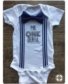 a baby bodysuit with the words mr onederful on it and a bow tie