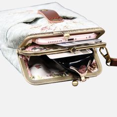 an open purse that is sitting on top of a table