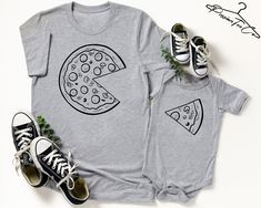 "--- PRICE IS PER SHIRT --- ★ HOW TO ORDER ★ 1. Check and review all photos. 2. Select SIZE and PRODUCT COLOR from drop-down menus. 3. You will see \"Add your personalization\" Please Enter Design: \"Whole Pizza\" OR \"Pizza Slice\" EXAMPLE: Pizza Slice 4. Click ADD TO CART. -REPEAT to add additional products to the cart. 5. Once everything is added, PROCEED TO CHECKOUT to purchase together. -For rush orders and faster delivery, select shipping upgrades during checkout 8 unique colors* for Unise Father's Day Cartoon Print Short Sleeve Top, Matching Short Sleeve Shirt For Father's Day, Family Matching Crew Neck Shirt With Cartoon Print, Father's Day Matching Short Sleeve Shirt, Cotton Shirt With Custom Print, Cute Crew Neck Shirt For Father's Day, Cute Father's Day Shirt With Crew Neck, Cute Cotton Shirt For Father's Day, Pizza T Shirt