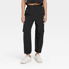 These Cinch Hem Woven Cargo Pants from JoyLab™ make a go-to pick for kickboxing or enjoying a walk in the park. In a casual fit, the high-rise cargo pants are crafted from stretchy midweight fabric to offer cool comfort through any activity. The elastic waistband and cinched hems at the ankle give you a stay-put fit, while side and cargo pockets provide space to stash your phone or other essentials. Pair these cargo pants with a tank top, tee or sweatshirt for versatile styling options. JoyLab™: A movement that’s always in motion. Walk In The Park, Ankle Leggings, Blue Leggings, Athletic Leggings, Seamless Leggings, Casual Fit, Womens Clothing Sizes, Pair Of Pants, Kickboxing