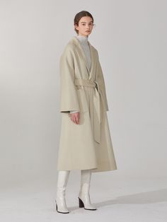 Editor's NotesThis oversized fit raglan sleeve coat made from cashmere wool blend has elegant loose silhouette expressing chic sophisticated mood. The belt helps creating different silhouettes with slender waist line.- Woolmark certified cashmere wool blend- Subtle shine and soft texture- Double layered fabric- Curved shoulder line- Self fabric belt- Reversible design- Side pockets on one side and patch pockets on the other- Notched collarMeasurements(in.)36(S) / 38(M)- Chest: 21.73 in. / 22.76 in.- Neck to Sleeve Length: 28.94 in. / 29.69 in. - Total Length: 45.51 in. / 46.50 in.* Model Info: Height 5' 9.5 , Bust 31.10 in., Waist 22.83 in., Hip 35.04 in. / Fitting size MComposition & Care- 30% Cashmere, 70% Wool- Dry cleaning onlyDesigner- by MUSEE Raglan Sleeve Coat, W Concept, Fabric Belt, Cashmere Wool, Mens Outerwear, Wool Coat, Mens Bottom, Raglan Sleeve, Oversized Fits