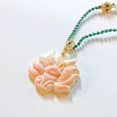 Pink Shell 粉贝 Nine Tailed Fox 九尾狐 Pendant 吊坠 White Carved Spiritual Jewelry, Traditional Shell Jewelry As Gift, Traditional Shell Jewelry Gift, White Amulet Jewelry With Natural Stones, Unique White Jade Jewelry, Pink Jade Jewelry With Natural Stones, White Jade Amulet Jewelry, White Carved Jade Jewelry, Carved White Jade Jewelry