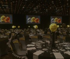 an empty banquet room with tables and chairs set up for formal function or social gathering