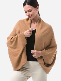 Our new WEARABLE Cashmere Wrap is designed to keep you elegantly warm on any occasion. Made of 100% premium cashmere, this versatile wrap instantly adds styles to any outfit. You can wear it in a variety of ways, making it ideal for travel, casual wear, or even as a cover-up for a wedding party! Warm and lightweight. We use superfine 100% cashmere from Inner Mongolia, so you don't have to worry about the cold and the bulk. Heavenly soft. Thanks to our new FlexKnit™ technology, making the 100% ca Winter Wool Pashmina Shawl, Elegant One-size Wraps For Fall, Elegant Fall Wraps, Chic Cashmere Shawl For Fall, One Size Cashmere Shawl Wrap, Fall Cashmere Shawl, Cashmere Shawl Outerwear For Winter, Cashmere Shawl Winter Outerwear, Winter Cashmere Shawl Outerwear