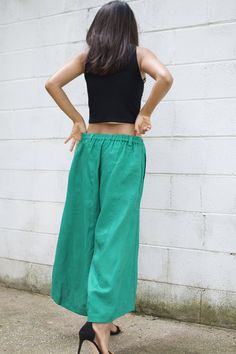 M E A S U R E M E N T S Waist 26 in. up to 40 in. (max with elastic band) Hips up to 54 in. Wide leg circumference 30 in. Inseam 23 in. Pocket 2 pockets Total length 35 in. Material High quality linen fabric M O D E L * Size US4 * Height 5 ft. 4 in. or 163 cm. With or without 4 in. high heels. These pants are a new addition to our linen pants collection. They're made with high quality linen with high end detailing and are tailored to make you look and feel your best! The pants are very roomy wit Baggy Green Wide Leg Pants With Elastic Waistband, Green Relaxed Fit Wide-leg Pants, Green Relaxed Fit Full-length Parachute Pants, Green Relaxed Fit Parachute Pants, Green Wide-leg Parachute Pants With Elastic Waistband, Green Cotton Harem Pants For Vacation, Baggy Green Bottoms With Elastic Waistband, Baggy Full-length Beach Pants, Baggy Full-length Pants For Beach