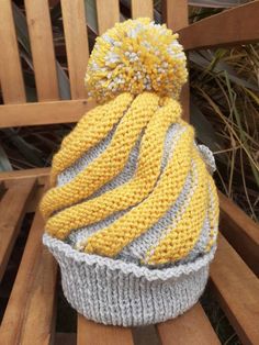 Hand knitted childs swirl bobble hat with hanging discs to the rear. In sparkling grey/sparkling mustard yarn. Detailed Hanging discs to the rear with a pear bead centre. Comes in 4 sizes. Pictured is the larger childs hat. Bobble Hat, Bobble Hats, Skull Cap Beanie, Skull Cap, Vintage Look, Vintage Looks, Hand Knitting, Caps Hats, Swirl