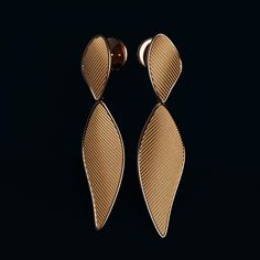 Elevate your elegance with these exquisite Italian-made dangle drop earrings by Oltremare Gioielli. Handcrafted with precision and artistry, these earrings are a true celebration of fine craftsmanship and luxurious materials.Made from your choice of 14k or 18k gold, these earrings feature:A ribbed textured surface that adds depth and sophisticationPolished edges for a sleek, refined finishA stunning length of 50 mm (2 inches) and width of 12 mm (0.47 inches), making them a statement piece withou Luxury White Gold Long Drop Earrings, Polished Finish Drop Earrings For Wedding, Elegant Polished Finish Drop Earrings, Elegant Gold Chandelier Earrings In Sterling Silver, Elegant Gold Long Drop Chandelier Earrings, Luxury White Gold Linear Earrings As Gift, Wedding Drop Earrings With Polished Finish, Luxury White Gold Linear Drop Earrings, Luxury Rose Gold Teardrop Earrings