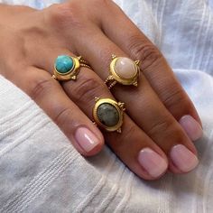 Bring some mystical vibes to your style with Earth Spirit Gem Rings! With their boho retro look, they'll add a little something special to any outfit. 🤩 And just look at those magical gems—they'll keep your spirit grounded, no matter how high your style game goes! 🤩✨ Each ring is adjustable, ensuring a perfect fit no matter the size of your finger. Slip one on and accessorize your look with a touch of classic, bohemian chic! 🥰 ✓ Material: Stainless Steel✓ Gemstone: turquoise, rose quartz, gre Adjustable Celestial Gemstone Jewelry, Adjustable Mystical Crystal Ring, Adjustable Celestial Crystal Ring With Gemstone, Adjustable Celestial Gemstone Ring, Celestial Style Gemstone Ring, Adjustable Spiritual Crystal Ring With Large Stone, Adjustable Gold Spiritual Turquoise Ring, Adjustable Gold Turquoise Ring In Spiritual Style, Bohemian Moonstone Ring With Large Stone