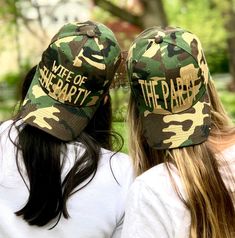 two women wearing hats that say wife of the party