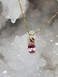 Lovely pink oval cut Tourmaline measuring 8.5x6.5mms set in 14K Gold with 3 natural accent diamonds. Pendant comes with matching 18" 14K Yellow gold chain. Tourmaline Pendant, Jewelry Showcases, Yellow Gold Chain, Recycled Metal, Recycled Gold, Gems Jewelry, Pink Tourmaline, Oval Cut, Gold Chain