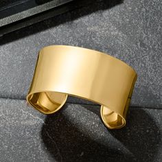 Ross-Simons - Italian 14kt Yellow Gold Wide Cuff Bracelet. 8". A minimalist design. A substantial silhouette. A phenomenal shine. This 1 1/8" cuff bracelet was crafted in Italy from brightly polished 14kt yellow gold. Flexible fit. Slip-on, 14kt yellow gold cuff bracelet. Luxury Wide Band Cuff Bracelet For Formal Occasions, Elegant Gold Cuff Bracelet With Thick Band, Elegant Gold Thick Band Cuff Bracelet, Classic Open Band Cuff Bracelet With Polished Finish, Luxury Wide Band Gold Bangle, Luxury Gold Wide Band Bangle, Gold Polished Cuff Bracelet, Modern Yellow Gold Wide Band Bracelet, Elegant Thick Band Bangle With Polished Finish