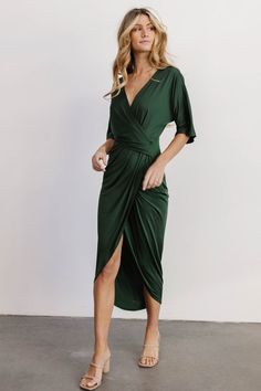 This stunning hunter green ruched midi dress features flattering pleating, kimono style sleeves, and a body-con design with stretch material. Elegant Green V-neck Short Sleeve Dress, Green Fitted V-neck Dress With Short Sleeves, Elegant Short Sleeve V-neck Dress For Brunch, Fitted Green V-neck Dress For Date Night, Fitted Green V-neck Dress For Work, Chic Green Fitted V-neck Dress, Stretch Short Sleeve Dresses For Brunch, Chic V-neck Bodycon Dress For Brunch, Knee-length Bodycon Maxi Dress For Brunch