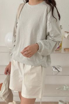 The Lounge MTM is your go-to for relaxed, comfortable style. Crafted from soft, breathable cotton, this long-sleeve top is perfect for casual days. It features a loose fit and simple crew neckline, offering effortless elegance. Available in a range of neutral colors, it's easy to pair with anything in your wardrobe. Whether you're lounging at home or out for a laid-back day, this top ensures you stay comfortable and chic. Color : Ivory / Mint / Black Size : One Size ( Fits X-small to Medium) Che The Lounge, Back Day, Comfortable Style, Effortless Elegance, Color Ivory, Comfortable Fashion, Neutral Colors, Crew Neckline, Set Dress