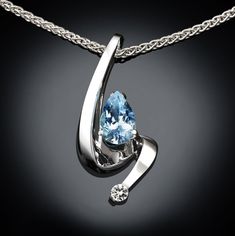 "Aquamarine and White Sapphire Necklace - Argentium Silver - 3380 - Argentium Chain Included A contemporary, yet timeless design by award winning designer, David Worcester. ( IMPORTANT - PLEASE READ 1. AND 2 BELOW ) 1.) INCLUDED IN THE PRICE IS AN ARGENTIUM SILVER CHAIN APPROPRIATE FOR THE PENDANT CHOSEN. YOU CAN CHOOSE FROM 16\", 18\" OR 20\" LENGTH AT CHECKOUT. 2.) PLEASE LOOK AT THE MEASUREMENTS CAREFULLY. SOME PHOTOS HAVE BEEN ENLARGED TO SHOW DETAIL, WHILE OTHERS HAVE BEEN MINIMIZED TO FIT Jewellery Hangers, Swiss Blue Topaz Necklace, White Sapphire Necklace, Alexandrite Necklace, Yucca Valley, Blue Sapphire Pendant, Blue Sapphire Necklace, Fine Gold Jewelry, Necklace Organizer