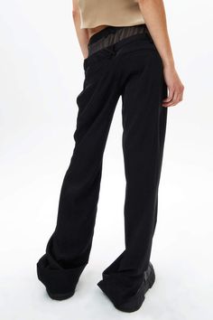 Loose-fit straight-leg trouser. Invisible button and zipper closure to the front. Double-waist design. See-through at waist. Two side-pockets. Model is 178cm (5'10), Wearing Size M. Body Color - Black Button color - Silver Body Fabric - 98% natural silk, 2% elastane. Classic Wide Leg Bottoms With Hidden Pockets, Straight Leg Bottoms With Hidden Button Closure For Workwear, Sleek Trousers With Belt Loops, Sleek Straight Pants With Belt Loops, Formal Straight Pants With Button Closure, Formal Straight Leg Bottoms With Button Closure, Chic Bottoms With Pressed Crease, Tailored Full-length Bottoms With Button Closure, Chic Wide Leg Pants With Hidden Button Closure