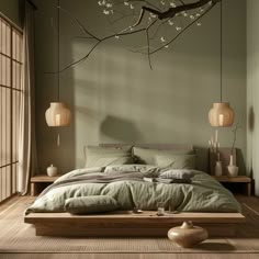 a large bed sitting under a tree in a bedroom