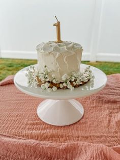 a white cake sitting on top of a table