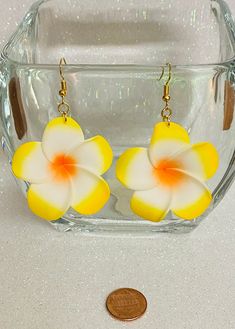 Hawaii 1.75 inch foam gold plated ear hooks dangling earrings. The drop length is 2.5 inches. The gold plated earring hooks are nickel free and tarnish resistant making them great for sensitive ears. These fun and lightweight earrings are a great gift for someone special! Yellow Hypoallergenic Flower-shaped Earrings, Gold Drop Earrings With Fish Hook, White Drop Earrings With Fish Hooks, Yellow Beach Earrings With Ear Wire, Yellow Earrings For Beach With Ear Wire, Yellow Flower-shaped Pierced Earrings, Yellow Flower-shaped Earrings, Yellow Flower-shaped Earrings With Ear Wire, Gold Flower-shaped Earrings For Beach