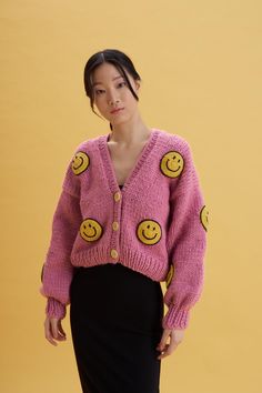 The 2D Smiley Pink Cardigan for women with soft 100% mix premium wools. It is very stylish, chunky, and warm. *The model is wearing a small size *Our cardigan comes without buttons. If you would like to add buttons please use our personalization box while ordering. *It is a unique piece that you can keep in your wardrobe for a lifetime. *Used soft mix wool *100% handmade  It is handcrafted by Gülçin, one of the precious members of our team. We believe in empowering women in all areas in todays' Trendy Winter Hand Knitted Outerwear, Trendy Hand Knitted Winter Outerwear, Trendy Hand Knitted Outerwear For Winter, Trendy Wool Cardigan, Hand Knitted Cardigan For Fall, Pink Smiley, Cardigan For Women, Pullover Outfit, Sweater Wool