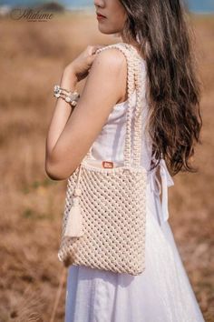 It doesn't have to be fancy or flashy. You just need to choose simple and gentle accessories that also make you stand out in the crowd. The hand-tied Macrame bag from ivory white cotton cord is a multi-style bag perfect for a clown beach accessory.  If it is paired with a maxi skirt, it's great. 🎗HANDMADE MACRAME SHEET BAGS🎗 Size: 49*24cm  ▶ Extremely delicate design style Boho Chic, Bohemian, Vintage. The product is very popular in Europe.  ▶ Women's armpit bag is convenient when going out, t Bohemian Rectangular Bag With Long Strap, Handmade Cream Crossbody Bag, Chic Handmade Cream Crossbody Bag, Cream Handheld Crochet Bag For Daily Use, Trendy Handmade Cream Shoulder Bag, Handmade Beige Handheld Shoulder Bag, Handmade Handheld Beige Shoulder Bag, Cream Crossbody Crochet Bag For Daily Use, Cream Crochet Crossbody Bag For Daily Use