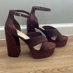 Never Worn. Two Toned Brown Sued Upper. Heel And Ankle Strap Are Brown Leather. Brown Platform Sandals With Pointed Toe, Brown High Heel Platform Block Heels, Brown Pointed Toe Platform Sandals, Brown Ankle Strap Block Heels For Party, Brown Platform Block High Heels, Brown Platform Heels For Night Out, Brown Open Toe Heels For Date Night, Brown Platform Heels For A Night Out, Chic Brown Heels For Date Night