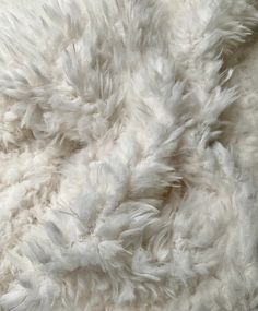 Natural off-white faux fur fabric, crafted to the highest standards of luxury and quality. With its super-soft texture and generous 1-inch pile, this fabric adds a touch of opulence to any project. Perfect for pillow decor or as a delightful photo prop for babies. Fur fabrics naturally shed hairs when cut, resulting in fluff falling off. To prevent this loss, simply overlock the raw edges to secure the material during construction. PRODUCT DETAILS 100% poly/cotton Slight stretch Medium heavy wei Cozy White Fur Coat With Faux Fur Lining, Animal Fur, Pillow Decor, Mini Craft, Fur Fabric, Faux Fur Fabric, Fur Fabrics, White Faux Fur, Animal Photo