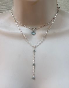 "This is one of my favorite chains to use, so fluid and shimmery. This cool tone sterling silver picks up all the colors in the rainbow. I placed faceted moonstones and blue topaz stones intermittently with bezel pendants on two of the strands. Each strand is separate with its own clasp and extension chain. Each necklace is sold separately or you can purchase all three as a set at a lower price. The top necklace with the Blue Topaz bezel pendant measures 15\" inches and comes with an additional Silver Dangle Gemstone Jewelry, Silver Sterling Silver Crystal Necklaces With Adjustable Chain, Silver Dangle Necklaces With Natural Stones, Silver Jewelry With Adjustable Long Drop Chain, Bohemian Sterling Silver Crystal Necklace, Handmade Sterling Silver Pendant Lariat Necklace, Handmade Sterling Silver Lariat Necklace With Pendant, Silver Gemstone Lariat Jewelry, Silver Lariat Gemstone Jewelry