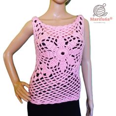 a mannequin wearing a pink crochet top