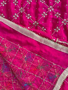 This elegant traditional Rani Pink Phulkari Dupatta is expertly crafted from Pure Chinon Silk, with Gotta Patti and phulkari hand embroidery all over. The perfect choice for weddings, sangeet, jaago, and chunni ceremonies. Material: Pure silk chinon Work: Silk thread phulkari handwork, all over gotta patti work Pattern: Floral Size: Full Size 2.5 meters Dispatched in 1-3 business days Product Note:​ This is a handcrafted product from artisans and producer groups and due to the nature of the prod Pink Raw Silk Sharara For Festivals, Pink Silk Sets With Dori Work, Pink Raw Silk Sharara For Navratri, Pink Raw Silk Anarkali Set With Dori Work, Traditional Tussar Silk Sharara With Dori Work, Pink Silk Anarkali Set With Dori Work, Pink Semi-stitched Traditional Wear For Festival, Pink Dori Work Dola Silk Kurta, Pink Traditional Wear With Resham Embroidery In Dola Silk