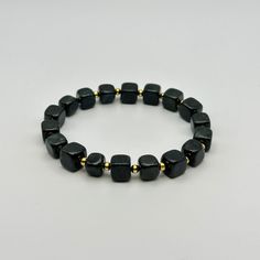 Elevate your style with our Black Jade Bracelet, a symbol of Luck and protection. This sleek, sophisticated piece features Genuine Jade Bracelet, exuding timeless elegance. Perfect for any occasion, its adjustable design ensures a comfortable fit for all. Embrace the power and beauty of black jade with this exquisite bracelet. Treat yourself or your loved ones with this handmade jewelry gift. This Items is Unisex will make a thoughtful holiday, birthday, Christmas, or anniversary gift for her/hi Modern Black Bracelet For Gift, Black Rectangular Beaded Bracelets For Gift, Modern Black Bracelets For Gifts, Rectangular Black Beaded Bracelets For Gifts, Modern Black Bracelet Gift, Modern Hematite Bracelets As A Gift, Modern Stretch Bracelet With Round Beads As Gift, Modern Stretch Bangle Bracelet As Gift, Adjustable Stackable Wristband As Gift