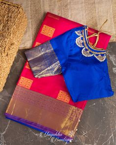 "Color : Magenta and Blue Magenta Pink and Deep Blue Kanchipuram ❤️❤️ How lovely this combination is ❤️ Magenta Pink body with Navy blue combination Pallu and Blouse. The body of this saree has \"Geometrical motifs\". Grab this beautiful bridal collection. This saree is for sure to look even more stunning when worn for any occasion.  This saree is very easy to drape and falls elegantly making it so effortless to carry around. *Fall, Pico & Tassels : Done *Condition : New Saree With Stitched Blou Blue Blouse For Puja And Eid, Red Blouse With Zari Weaving For Traditional Ceremonies, Red Blouse With Traditional Patterns For Navratri, Traditional Multicolor Blouse With Zari Weaving, Semi-stitched Blouse With Traditional Patterns For Navratri, Blue Blouse With Zari Weaving For Festivals, Red Anarkali Blouse With Traditional Patterns, Transitional Blue Blouse With Self Design, Traditional Multicolor Paithani Silk Blouse