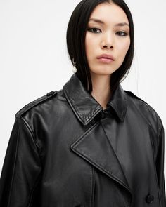 Leather on a different level. The Hendry is a highlight in our new season collection. Crafted from soft leather to a relaxed, cropped double breasted silhouette with drop shoulders. Taking its cues from classic trenches, it features storm flap detailing and wide sleeves that can be adjusted with a buckle fastening. The lightweight leather keeps things easy while the washed technique gives it an authentic vintage look that highlights the natural highs and lows within the leather. Complete with Al Jeans Trousers Women, All Saints Leather Jacket, Allsaints Fitted Leather Outerwear, Allsaints Women's Biker Outerwear, Allsaints Fitted Luxury Leather Jacket, Allsaints Black Leather Jacket Long Sleeve, Leather Trench, Trench Coat Black, Leather Trench Coat