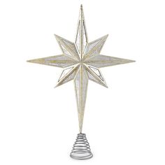 a gold and white christmas ornament with a star hanging from it's side