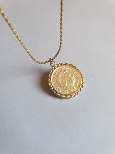 Solid gold coin necklace, gold coin pendant necklace, antique necklace, British coin gold necklace, 14k gold necklace Solid gold 14k necklace with an old british gold coin pendant, great for everyday wear, unique and beautiful. The chain is made of 14k solid gold and available in a few styles and lengths and the pendant is an original coin which I decorate with twisted gold wires and is available in 9k or 14k solid gold. Dimensions: The coin pendant's diameter is about 0.75 inch (2 cm). There ar Tarnish-resistant Yellow Gold Coin Necklace, 14k Gold Necklace With Coin Pendant, 14k Gold Necklace With Round Coin Pendant, Vintage Yellow Gold Tarnish Resistant Medallion Necklace, Vintage Yellow Gold Tarnish-resistant Medallion Necklace, Classic Gold-plated Coin Necklace, Antique Gold Round Coin Necklace, Classic 14k Gold Coin Necklaces, Gold Coin Necklace Tarnish Resistant