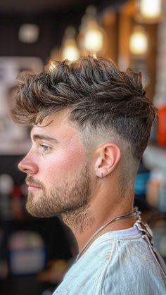 Get Faded: 27 Hairstyles That Showcase Men's Boldness Men’s High Fade Haircut, Mens Faux Hawk Fade, Edgy Haircuts Men, Edgy Mens Haircut, Fauxhawk Fade Men, Popular Haircuts For Men, Faux Hawk Men, Classic Mens Haircut, Low Taper Fade Haircut